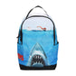 Backpack with a shark and swimmer design on a white background