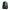 Black backpack with blue accents and a whale design on a white background