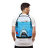Person wearing a backpack with a shark design on a white background