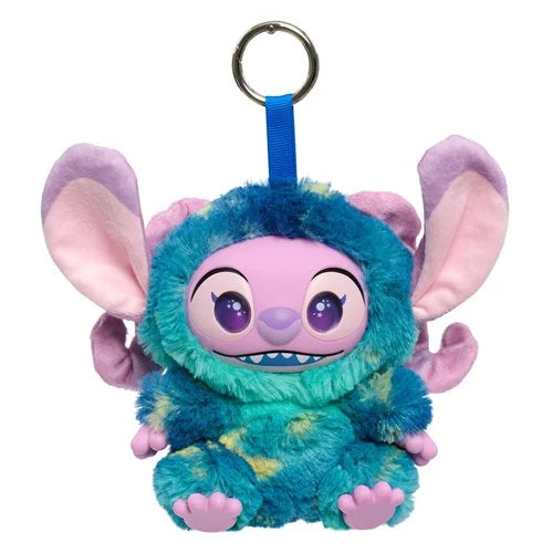 A plush character keychain featuring a blue and teal furry creature with pink inner ears, purple eyes, and a metal key ring at the top, shown on a plain white background.