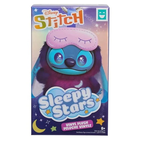 Disney Stitch Sleepy Stars vinyl plush toy in its original retail packaging, featuring Stitch wearing a pink sleep mask on a purple and blue starry background.