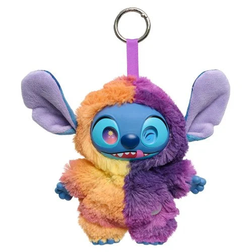 Plush toy character with rainbow fur and purple wings on a white background