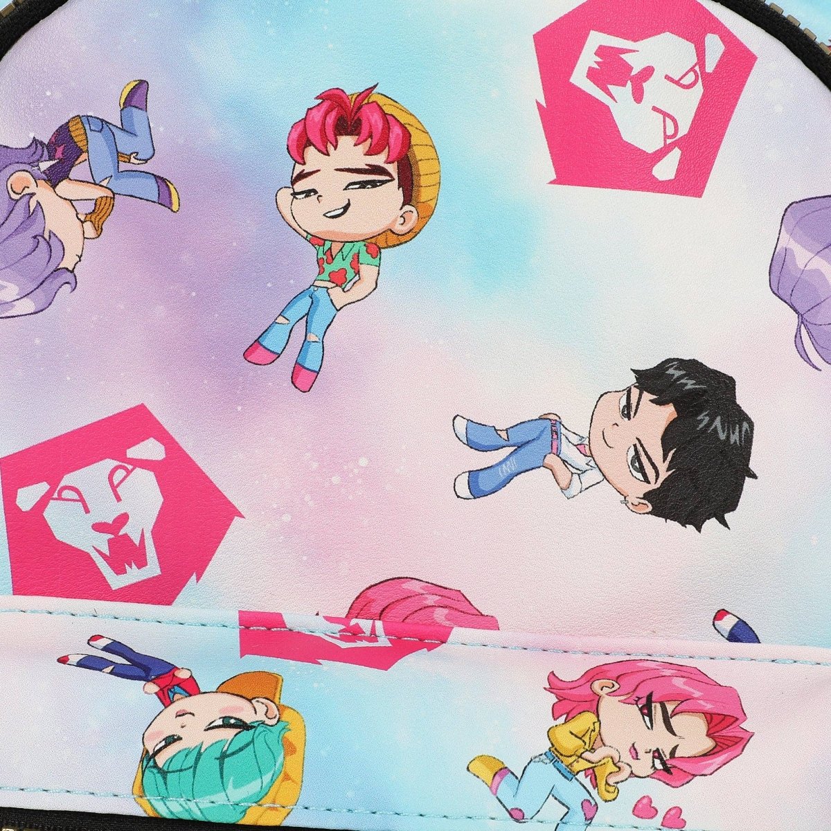 Cartoon characters with colorful backgrounds and pink logos on a product surface.