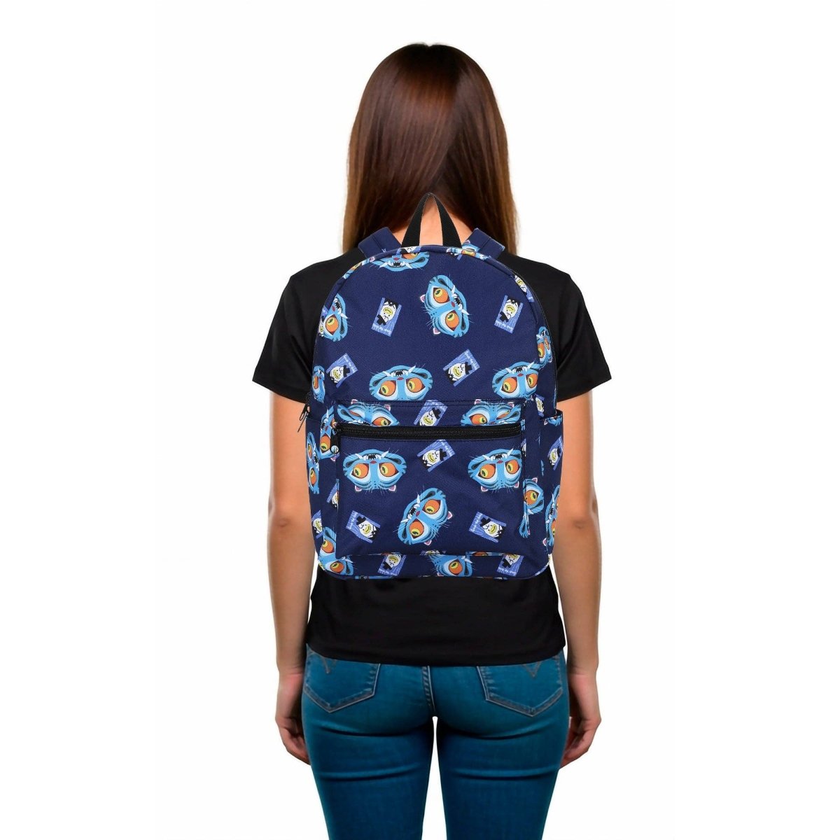Person wearing a navy blue backpack with cartoon character pattern on a white background