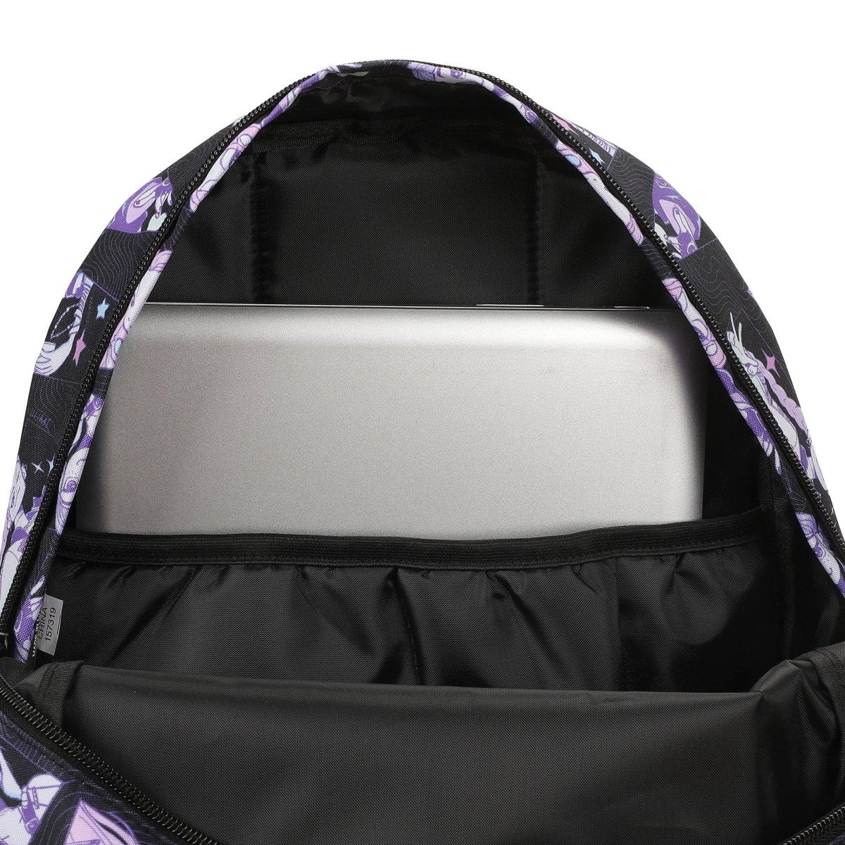 Backpack with purple floral pattern inside, containing a white laptop.