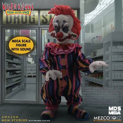 Colorful clown figure with red hair and striped suit in a store setting, featuring text about Mega scale figure with sound.