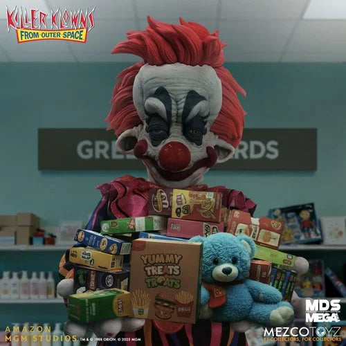 Clown figure holding boxes and a teddy bear with 'Killer Klowns from Outer Space' branding.