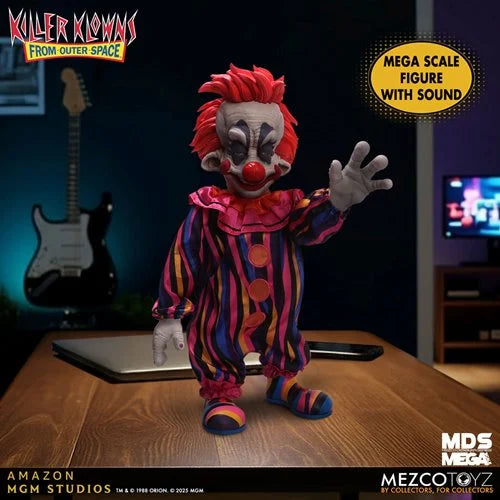 Colorful clown figure with red hair and a striped suit on a wooden table, with 'Killer Klowns from Outer Space' branding.