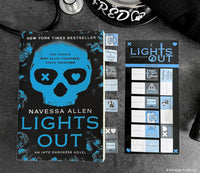 Book titled 'Lights Out' by Navessa Allen with a blue skull design on a dark background.
