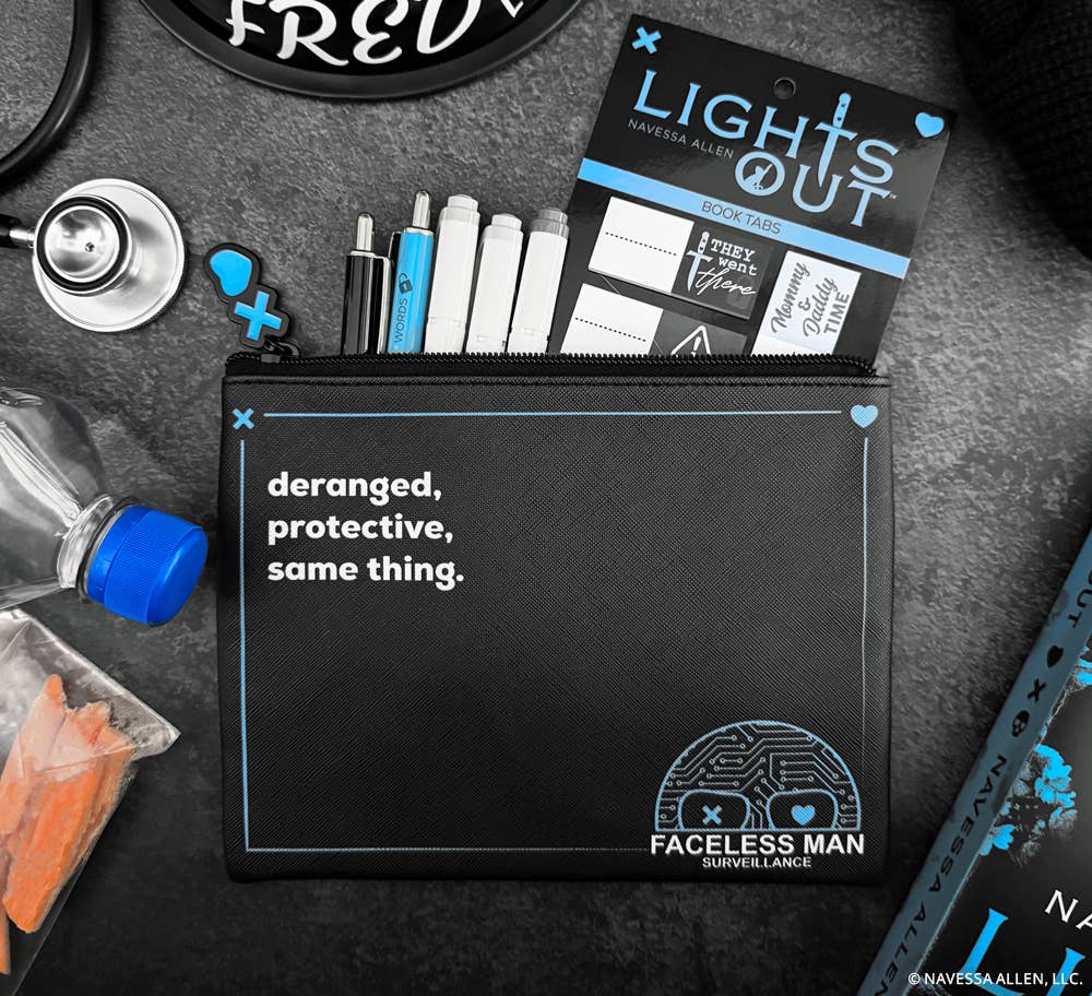 Black pouch with text and branding on a dark surface with various items.