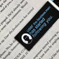 Sticker with text 'user the.faceless.man has started following you.' on a piece of paper.