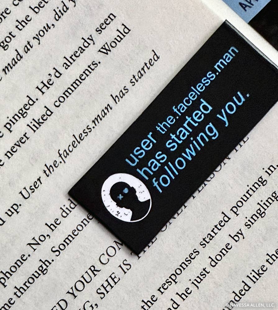 Sticker with text 'user the.faceless.man has started following you.' on a piece of paper.