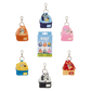 Six Bluey-themed cupcake coin purse keychains in different colors, arranged around a central Bluey character packaging card on a plain white background.