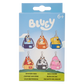 Bluey brand mystery box bag charm packaging, featuring six different cartoon dog bag charms in various colors (purple, orange, blue, red, black, pink) on a light blue and green box.