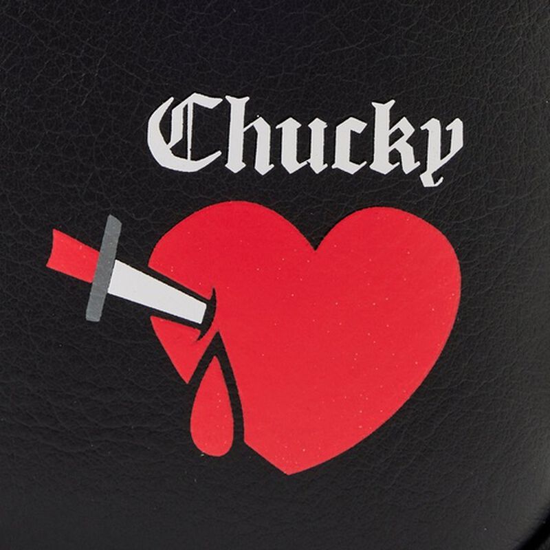 Red heart with a knife and 'Chucky' text on a black background