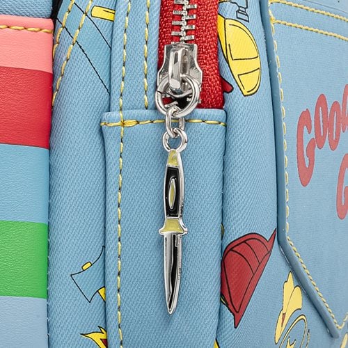 Colorful bag with a knife-shaped keychain attached to the zipper