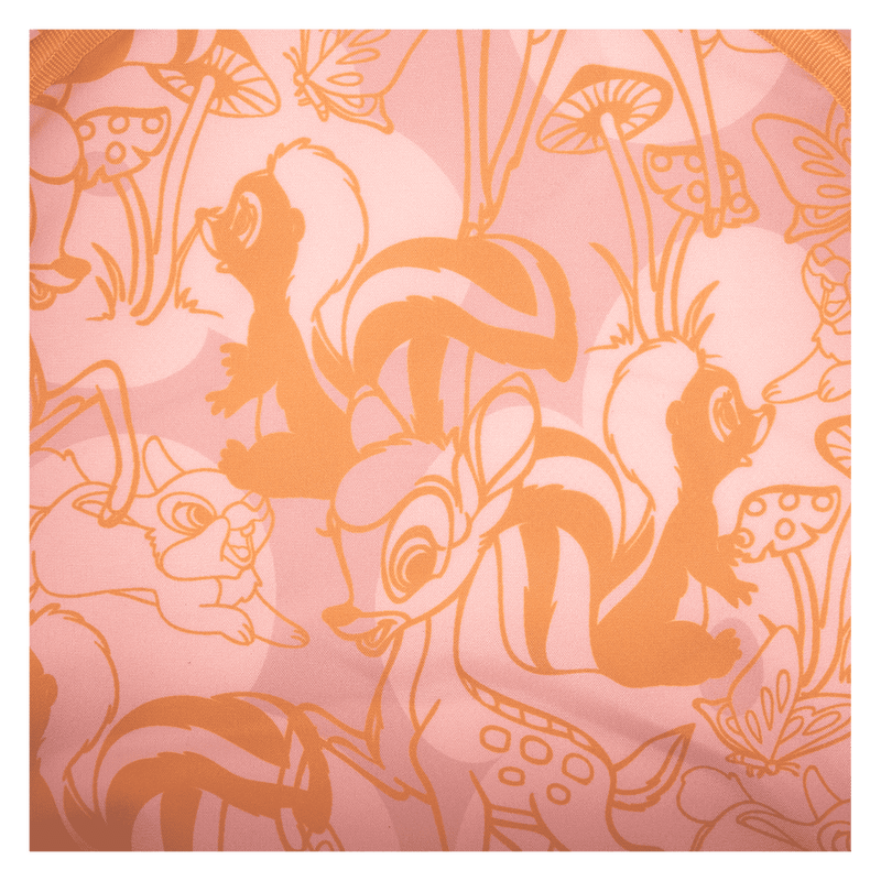 Patterned fabric with orange outlines of animals and plants on a pink background