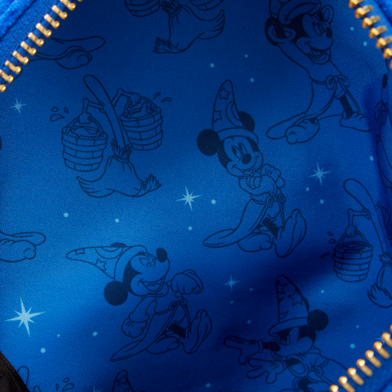 Blue fabric with black line art of cartoon characters and stars on a blue background.
