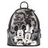 A Disney Minnie Mouse and Mickey Mouse backpack with a gray and black camouflage pattern, featuring black-and-white cartoon characters and spooky silhouettes on a white background.