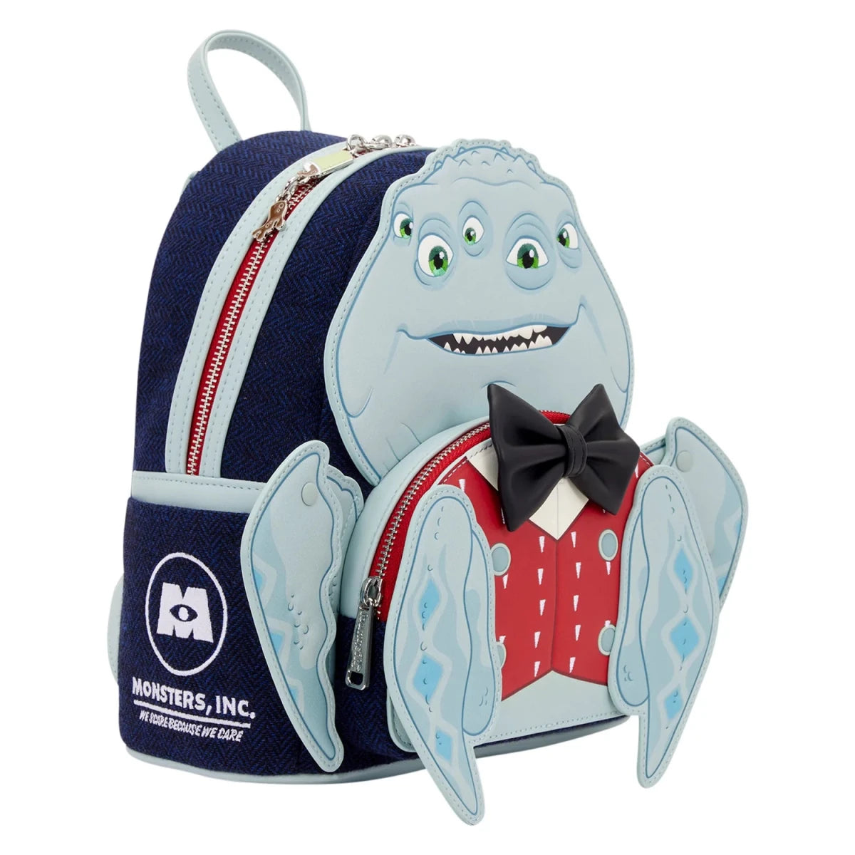 A Disney Monsters, Inc. character backpack featuring Mike Wazowski, with a navy blue body, light blue wings and face, a red vest, black bow tie, and white logo details, shown on a plain white background.
