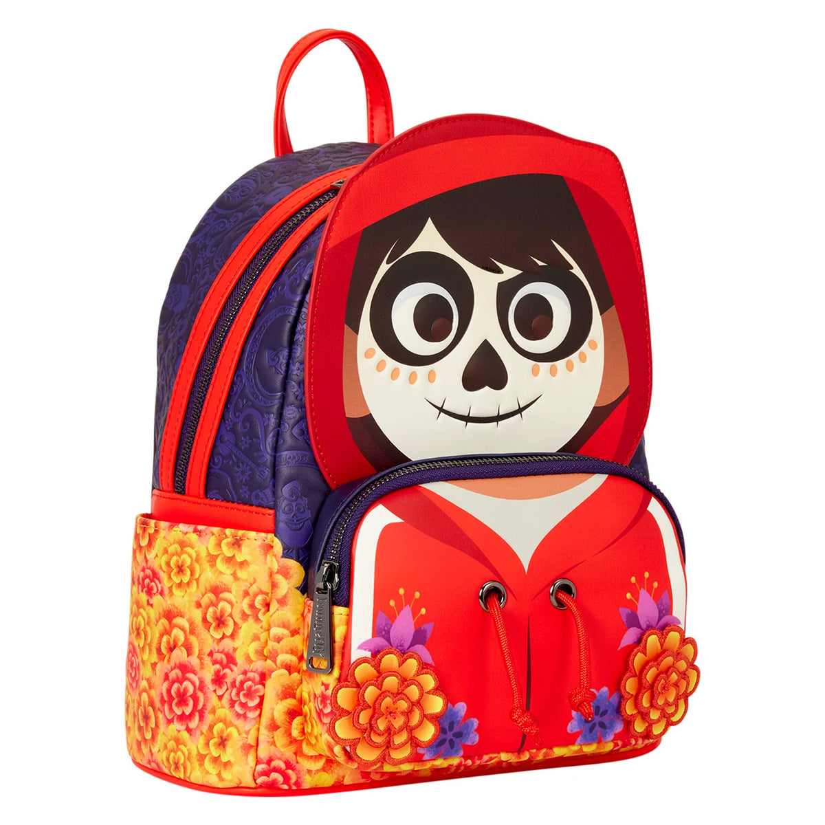 A Day of the Dead themed mini backpack featuring a large sugar skull graphic on the front, a red hooded design, a purple patterned upper section, and a yellow floral marigold pattern on the side pocket.