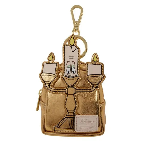 A metallic gold Disney Lumiere keychain pouch shaped like the character from Beauty and the Beast, featuring embroidered details, a gold clasp, and a small white brand patch on a white background.