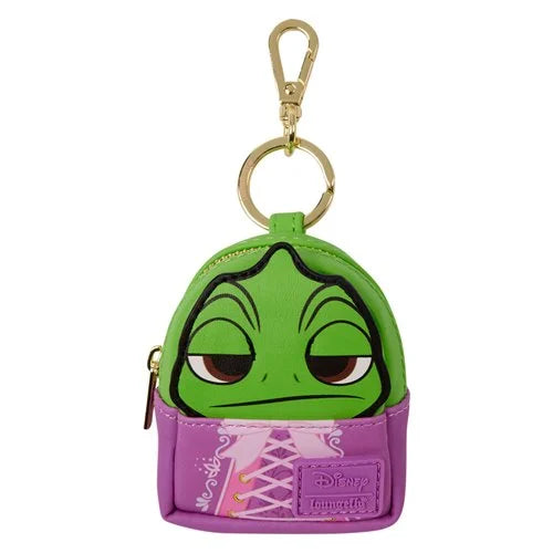 A small Disney-themed keychain pouch featuring a green character face above a purple skirted base with pink lace details, attached to a gold clasp on a white background.