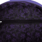 Close-up of a purple floral patterned bag with a zipper.