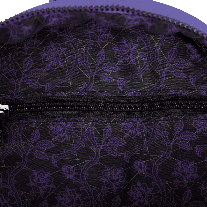 Close-up of a purple floral patterned bag with a zipper.