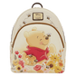 Backpack with Winnie the Pooh design featuring flowers and bees on a white background.