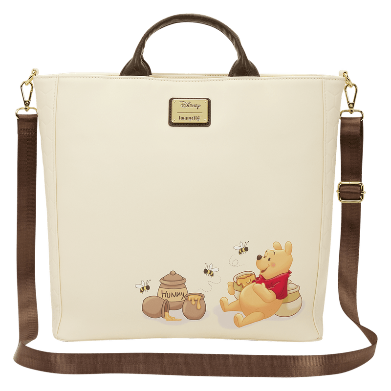 Beige bag with cartoon bear design featuring honey pots and bees, Disney logo visible.
