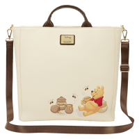 Beige bag with cartoon bear design featuring honey pots and bees, Disney logo visible.