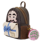A small dark brown and cream backpack with a printed cartoon face on the front, a blue bow detail on the front pocket, and a round pink coin purse attached with gold hardware. The coin purse reads 'HAPPEN BIRTHDAY HARRY.