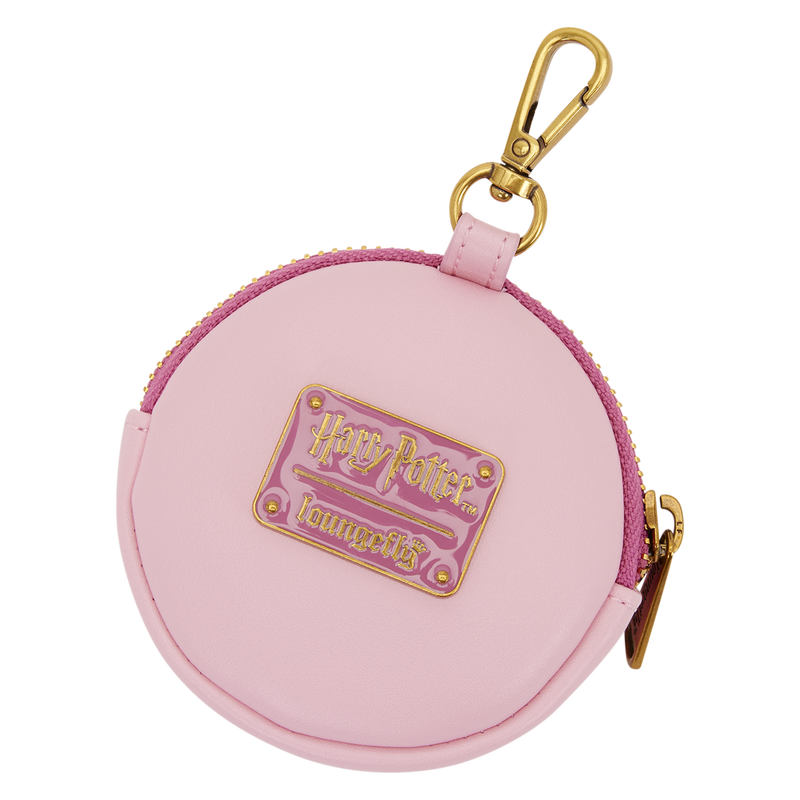A round pink faux-leather coin purse featuring a gold-tone metal clasp and a central gold and pink 'Harry Potter's Lavandist' logo patch.