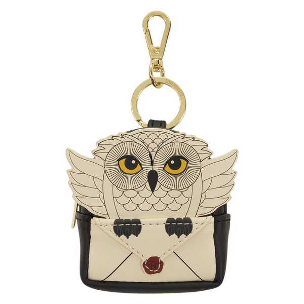 Owl-shaped keychain with a gold clasp on a white background