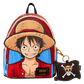 Backpack with character design and keychain on a white background