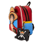 Backpack with character design and keychain on a white background