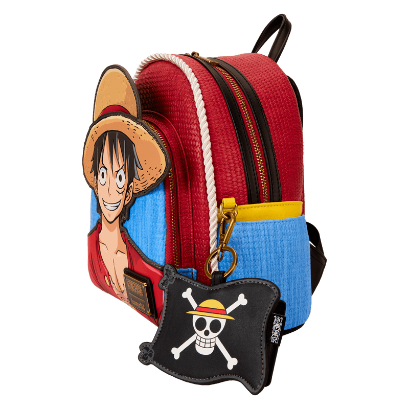 Backpack with character design and keychain on a white background