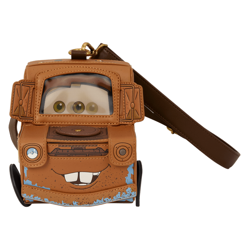 A brown Mater-themed crossbody bag designed like the Disney Pixar character Mater, featuring a clear window showing cartoon eyes, a printed smile, and a brown shoulder strap on a white background.
