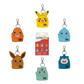 Set of colorful keychains shaped like cartoon characters on a white background