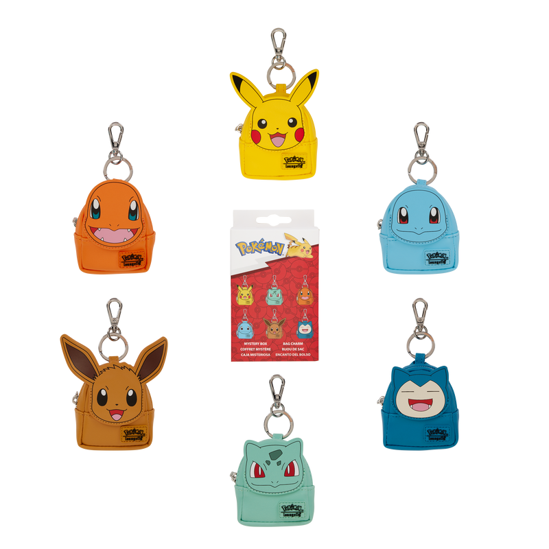 Set of colorful keychains shaped like cartoon characters on a white background