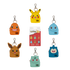 Set of colorful keychains shaped like cartoon characters on a white background