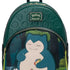 A Loungefly x Pokemon backpack featuring Snorlax on the front pocket, with a dark green embossed top panel and a black side pocket.