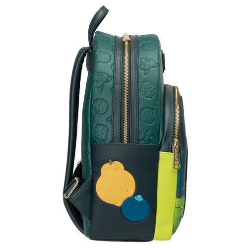A dark green and navy backpack featuring embossed fruit patterns, gold zippers, and a front pocket with applique patches of yellow and blue fruit on a white background.