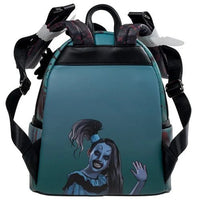 Backpack with a character design on a teal background