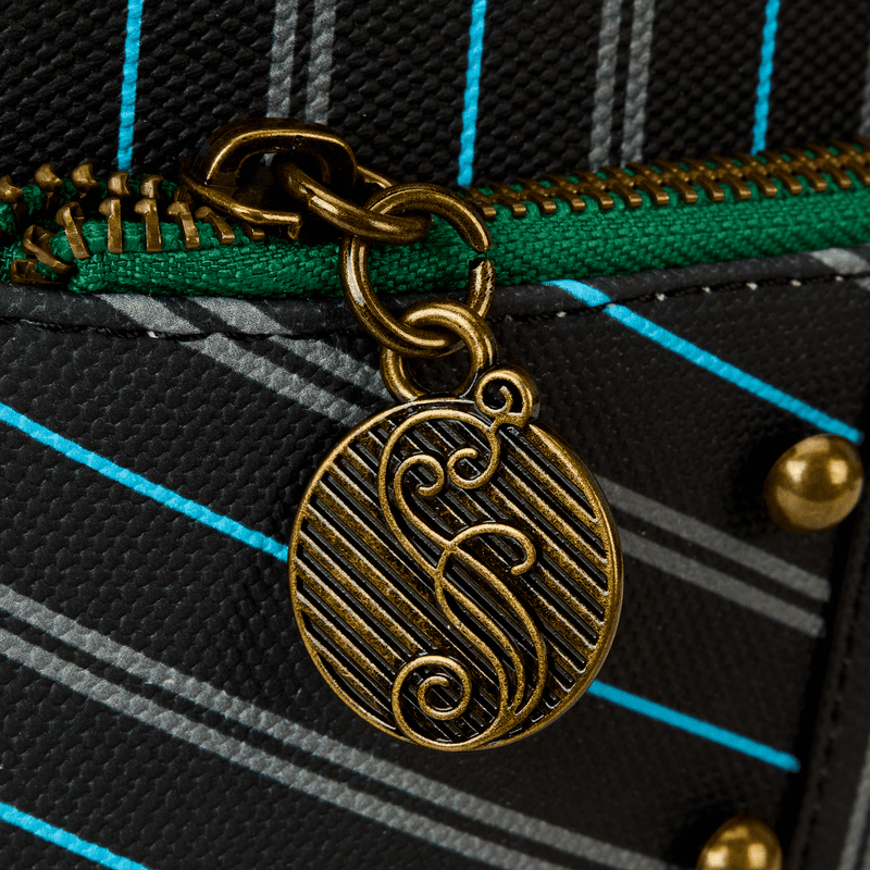 Loungefly Elphaba mini backpack styled as Shiz University uniform, complete with embroidered patches, buckles, and an eye-catching green finish perfect for cosplay or everyday use.