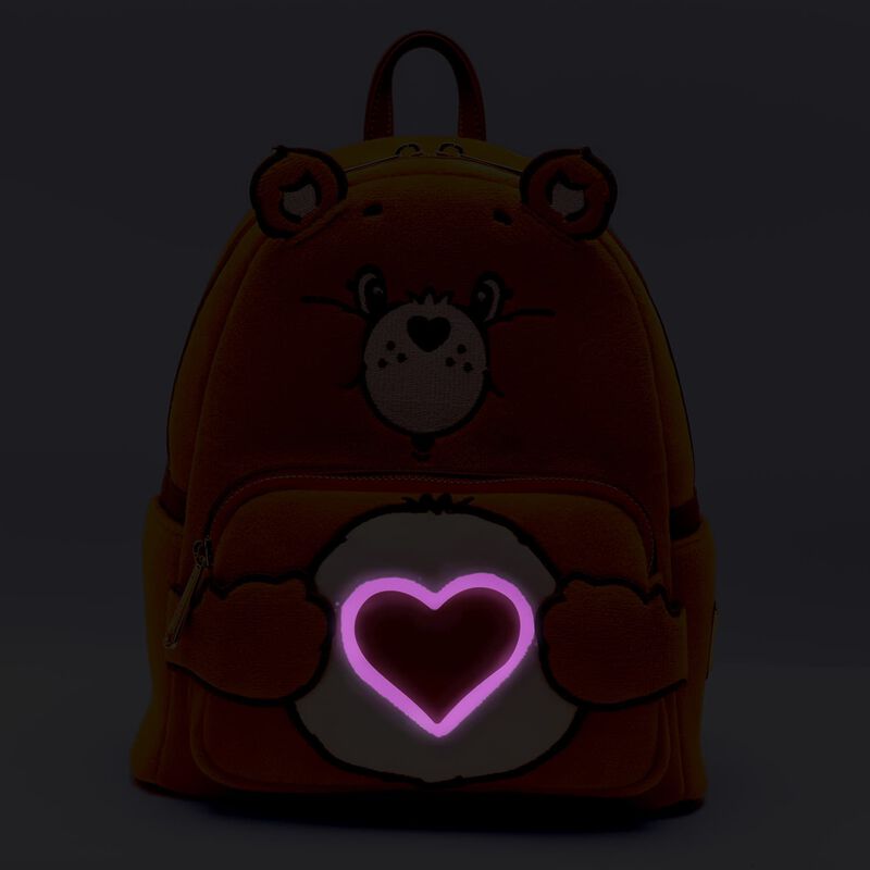 Loungefly mini backpack featuring Tenderheart Bear plush body and light-up glow accents