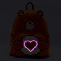 Loungefly mini backpack featuring Tenderheart Bear plush body and light-up glow accents