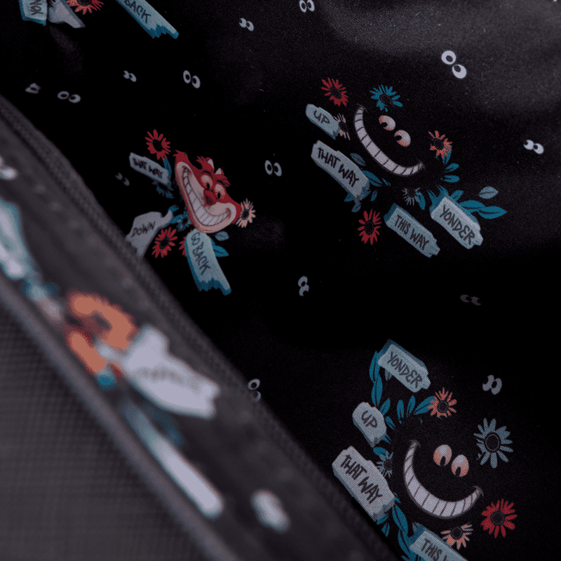 Loungefly Disney Alice in Wonderland bag with Cheshire Cat and Tulgey Wood forest accents