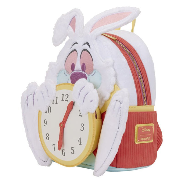 Plush backpack with cartoon character face and clock face on a white background